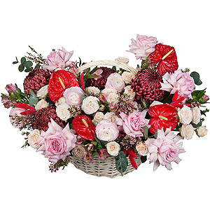 Red cut anthurium - 4, Chrysanthemum Bigoudi purple - 4, Peony style roses - 7, Ranunculus Pink - 5, Alstromeria white, soft pink - 19, Peony sprayrose - 5, Medium Basket, Oasis, Waxflower (1 pc.), Eucalyptus, Dried flowers in assortment