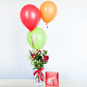 Red rose 50 cm - 5, Chamomile - 3, Aspidistra (1 pc.), Ruscus, Ribbon, Lindt Candy Box, Helium Balloon (1 pc.)