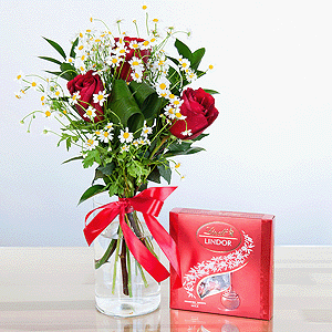 Red rose 50 cm - 7, Chamomile - 3, Aspidistra (1 pc.), Ruscus, Ribbon, Lindt Candy Box