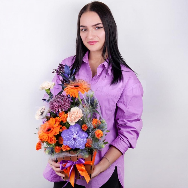 Gerbera daisies - 2, Chrysanthemum Bigoudi purple - 2, Spray rose: yellow, orange 50 cm - 2, Vanda Orchid bud - 1, Carnation white, cream - 5, Wooden pot, Oasis, Ruscus, Pistachio, Flask for orchids, Eryngium, Dried flowers decor, Decorative element small, Ribbon