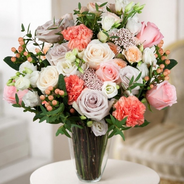 Pink rose 50 cm - 3, Carnations - 3, lisianthus - 3, Spray rose 50 cm (multiple small blooms on a stem) - 2, White rose 50 cm - 2, Rose Powder 50 cm Ecuador (Quicksand, Menta) - 4, Ozotamnus, Eucalyptus parvifolia (1 pc.), Hypericum, Wrapping Paper, Ribbon