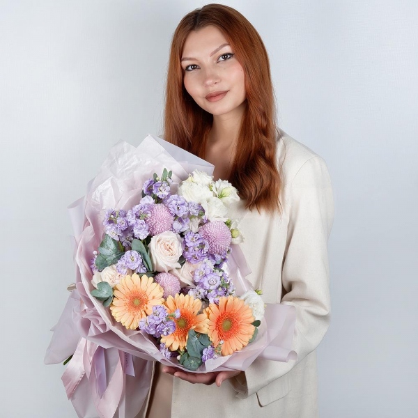 Cream gerbera - 11, Peony style roses - 3, Momoko Chrysanthemum - 3, Matthiola Lilac - 5, lisianthus - 5, Eucalyptus, Wrapping Paper