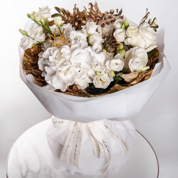 White rose 50 cm Ecuador - 5, lisianthus - 4, Spray rose: white, cream, light pink 50 cm - 1,  White Hydrangea - 1, Pistachio, Decorative crown, Wrapping Paper