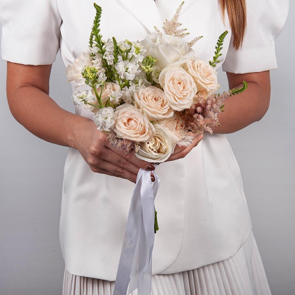 White rose 50 cm Ecuador - 3, Peony sprayrose - 2, White Matthiola - 3, Carnation white, cream - 7, Veronica spray, Astilbe, Ribbon