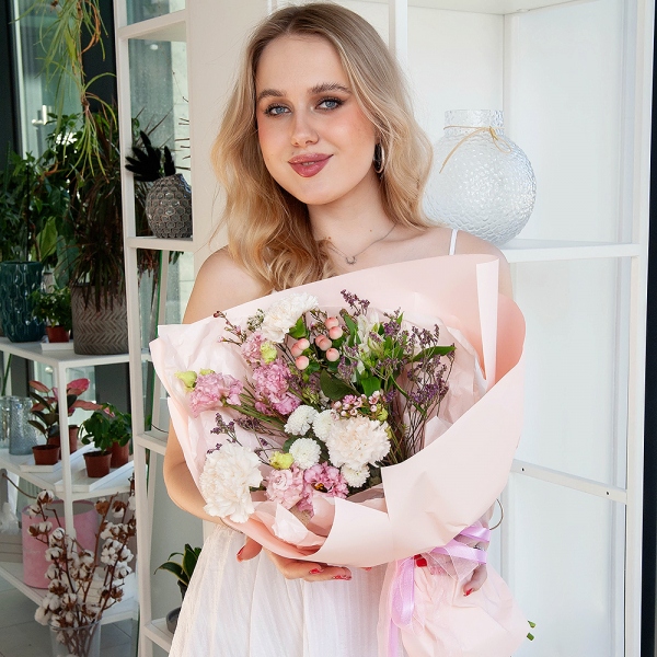 Carnation white, cream - 5, Newton White Spray Chrysanthemum - 1, Alstromeria white, soft pink - 1, Pink Lisianthus (Eustoma) - 2, Hypericum, Limonium (1 pc.), Waxflower (1 pc.), Wrapping Paper