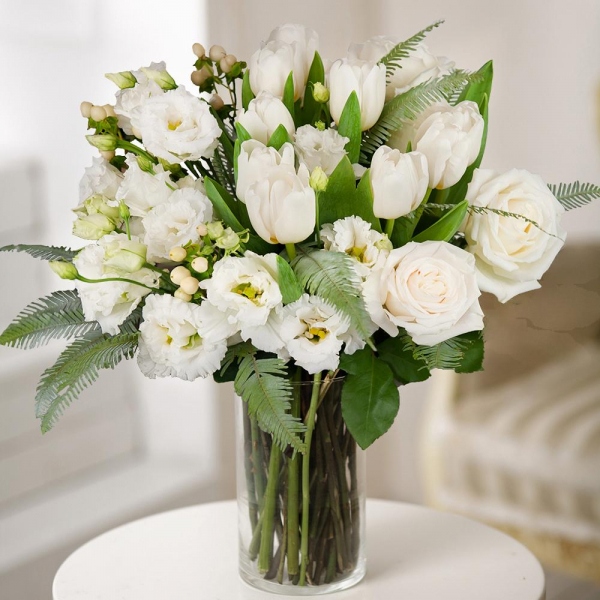 White rose 50 cm - 7, lisianthus - 4, Tulip white - 12, Ambrella, Hypericum, Wrapping Paper, Ribbon