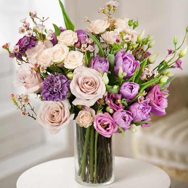 Lilac tulip - 11, Spray rose: white, cream, light pink 50 cm - 3, Pink Lisianthus (Eustoma) - 5, White rose 50 cm - 6, Lilac carnation - 3, Waxflower (1 pc.), Wrapping Paper