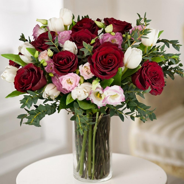 Red rose 50 cm - 15, Pink tulip - 13, Pink Lisianthus (Eustoma) - 5, Eucalyptus parvifolia (1 pc.), Wrapping Paper