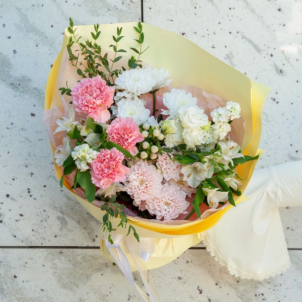 Pink carnation - 3, White Matthiola - 2, Baltica White Spray Chrysanthemum - 2, Alstromeria white, soft pink - 2, lisianthus - 1, Hypericum, Eucalyptus parvifolia (1 pc.), Wrapping Paper