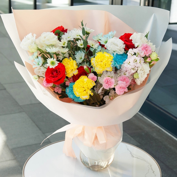 Red rose Nina 50 cm - 9, lisianthus - 2, Chrysanthemum spray Bacardi dyed blue - 4, Pink spray carnation - 9, Carnation white, cream - 10, Pink Matthiola - 1, Eucalyptus parvifolia (1 pc.), Wrapping Paper
