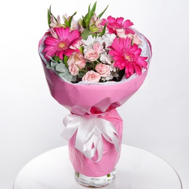 Gerbera daisies - 3, Bacardi White Spray Chrysanthemum - 1, Carnation spray - 2, Spray rose 50 cm (multiple small blooms on a stem) - 2, Alstromeria white, soft pink - 1, Eucalyptus Cinerea, Wrapping Paper, Ribbon