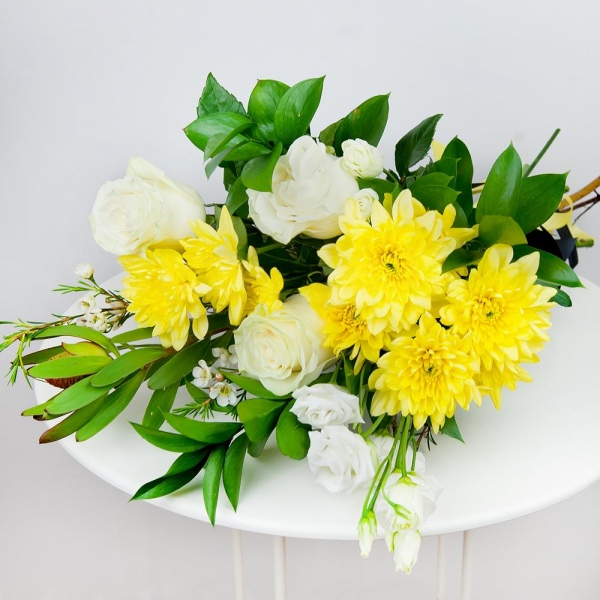 Baltica Yellow Spray Chrysanthemum - 3, White rose 50 cm - 4, lisianthus - 2, Leukodendron, Waxflower (1 pc.), Ruscus, Ribbon