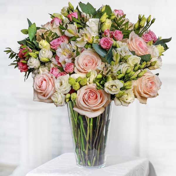 Rose Cream 50 cm - 13, Bright pink spray rose mix, 50 cm - 13, lisianthus - 11, Alstromeria white, soft pink - 7, Pistachio, Eucalyptus Cinerea, Sisal, Ribbon
