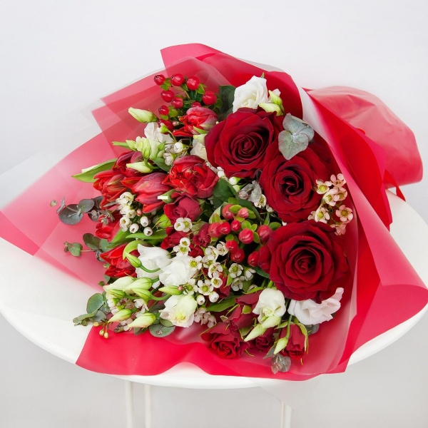 Red rose 50 cm - 5, lisianthus - 4, Spray rose: red 50 cm - 3, Red tulip - 10, Waxflower (1 pc.), Hypericum, Eucalyptus Cinerea, Wrapping Paper