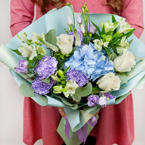 Blue/purple hydrangea - 2, Lilac carnation - 5, Alstromeria white, soft pink - 4, Purple Lisianthus (Eustoma) - 4, White rose 50 cm - 5, Veronica spray, Eucalyptus populus (1 pc.), Wrapping Paper