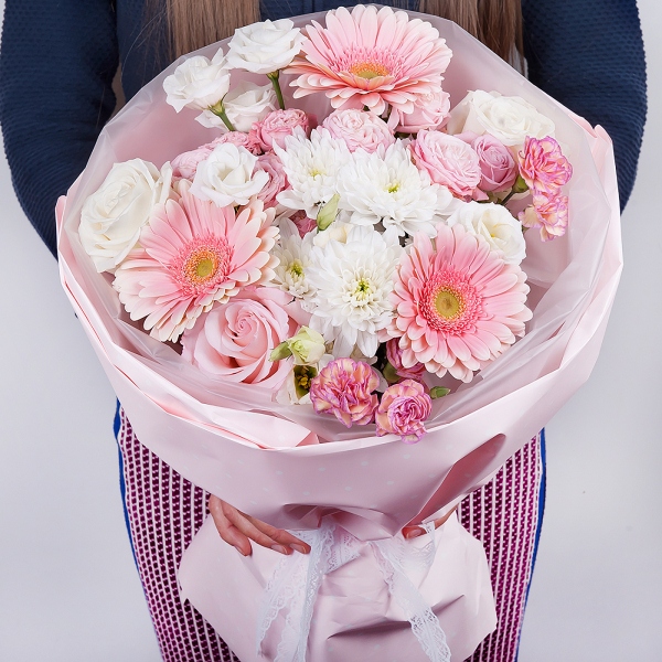 Gerbera pink - 3, Pink rose 50 cm - 3, White rose 50 cm - 2, Baltica White Spray Chrysanthemum - 1, Peony sprayrose - 2, Pink spray carnation - 2, lisianthus - 2, Wrapping Paper