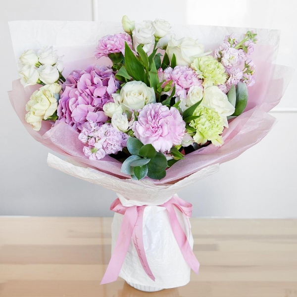 Pink Hydrangea - 1, Alstromeria white, soft pink - 3, Pink Matthiola - 4, White rose 50 cm - 5, lisianthus - 2, Green carnation - 3, Pink carnation - 4, Pistachio, Ruscus, Wrapping Paper