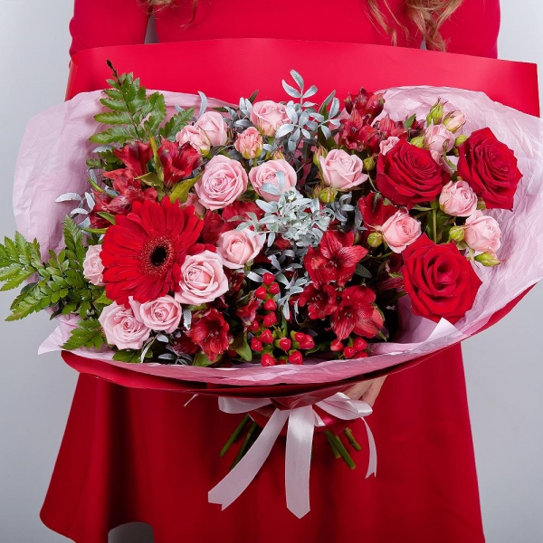 Gerbera red - 1, Red rose 50 cm - 5, Bright pink spray rose mix, 50 cm - 4, Alstromeria Red, Bright Pink - 7, Hypericum, Pistachio, Fern (1 pc.), Wrapping Paper, Ribbon