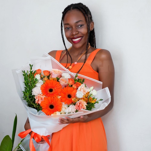 Gerbera daisies - 3, Pink-orange rose Phoenix 50 cm - 9, Alstromeria Yellow, Orange - 6, Spray rose: yellow, orange 50 cm - 2, lisianthus - 1, Carnation white, cream - 10, Spray rose: white, cream, light pink 50 cm - 3, Pistachio, Wrapping Paper
