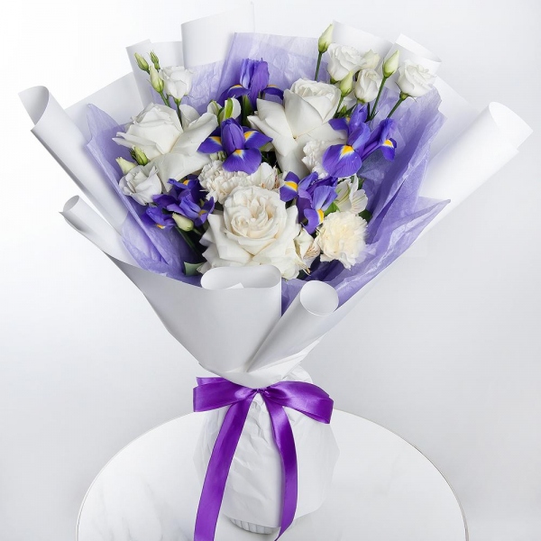 Irises - 6, White rose 50 cm Ecuador - 3, lisianthus - 2, Alstromeria white, soft pink - 3, Carnation white, cream - 4, Wrapping Paper