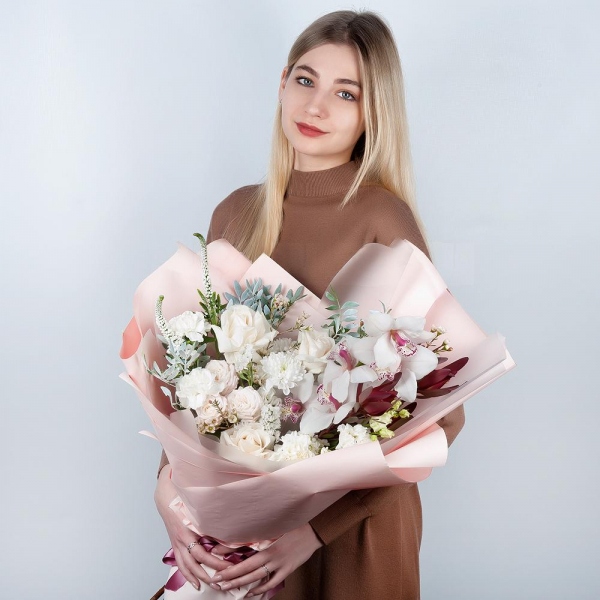 White Cymbidium Orchid Bud - 5, White rose 50 cm Ecuador - 5, Spray rose: white, cream, light pink 50 cm - 2, Baltica White Spray Chrysanthemum - 2, Carnation white, cream - 3, lisianthus - 1, White Matthiola - 1, Leukodendron, Veronica spray, Pistachio, White statice, Waxflower (1 pc.), Wrapping Paper