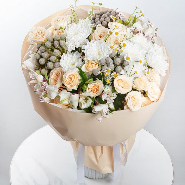 Spray rose: white, cream, light pink 50 cm - 5, Baltica White Spray Chrysanthemum - 3, Alstromeria white, soft pink - 7, Chamomile - 4, Brunia Green Lanuginosa (1 pc.), Wrapping Paper