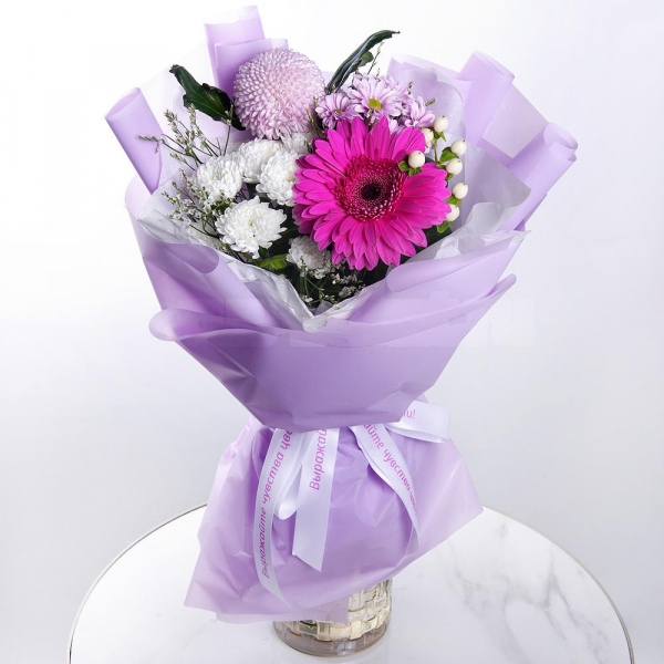 Purple gerbera - 1, Baltica White Spray Chrysanthemum - 2, Momoko Chrysanthemum - 1, Daisy poms Santini pink, purple - 1, Hypericum, Limonium (1 pc.), Wrapping Paper