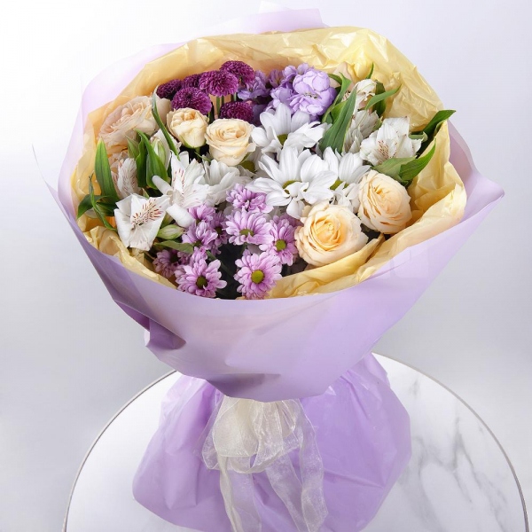 Bacardi White Spray Chrysanthemum - 1, Daisy poms Santini pink, purple - 1, Alstromeria white, soft pink - 5, Matthiola Lilac - 1, Spray rose: white, cream, light pink 50 cm - 4, Spray Chrysanthemum Newton purple - 1, Wrapping Paper