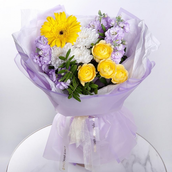 Baltica White Spray Chrysanthemum - 1, Gerbera yellow - 5, Spray rose: yellow, orange 50 cm - 1, Matthiola Lilac - 2, Pistachio, Wrapping Paper