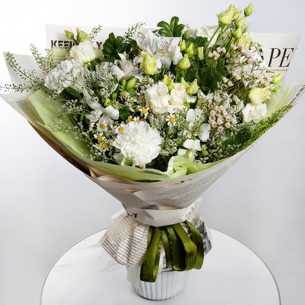 Carnation white, cream - 7, lisianthus - 2, Alstromeria white, soft pink - 5, Chamomile - 2, Pistachio, Veronica spray, Green bell (1 pc.), Waxflower (1 pc.), Limonium (1 pc.), Wrapping Paper
