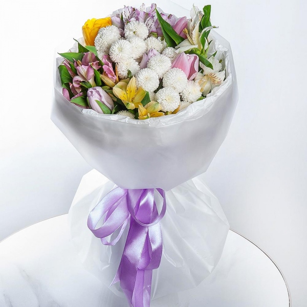 Newton White Spray Chrysanthemum - 2, Alstromeria white, soft pink - 2, Lilac tulip - 5, Alstromeria Yellow, Orange - 1, Alstromeria lilac, purple - 1, Pink tulip - 5, Yellow tulip - 3, Wrapping Paper